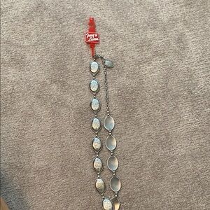 Tony Lama Silver Belt with Vintage Elegance